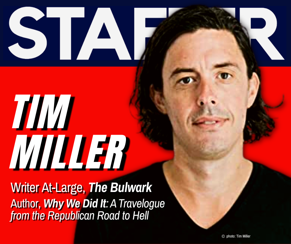 Tim Miller infront of red and blue staffer background.