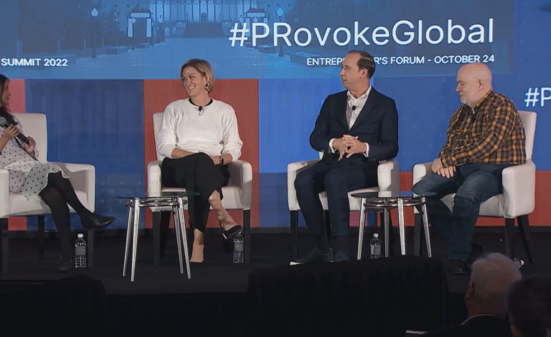Tanya speaking with a panel